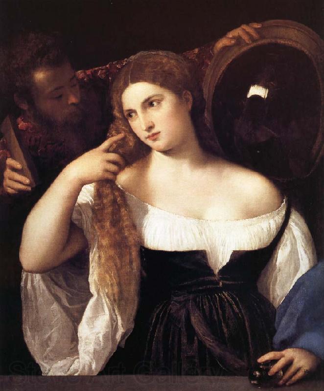 TIZIANO Vecellio Portrait d'une femme a sa toilette